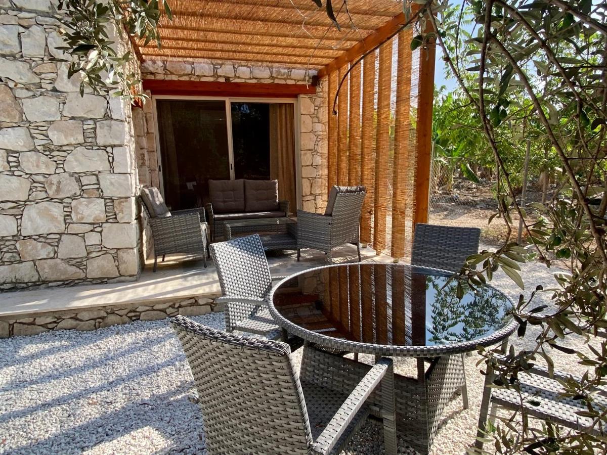 Ammos Luxury Suits And Residences Пея Екстериор снимка