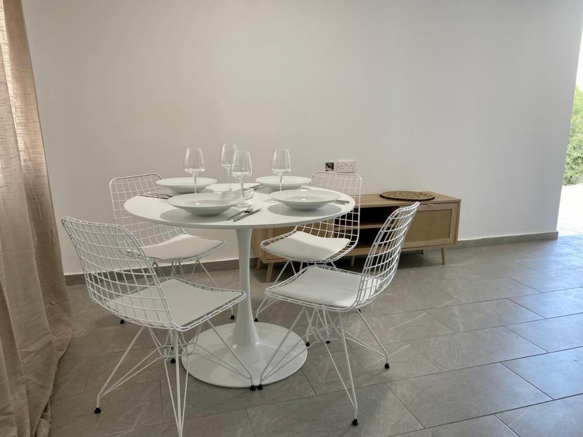 Ammos Luxury Suits And Residences Пея Екстериор снимка