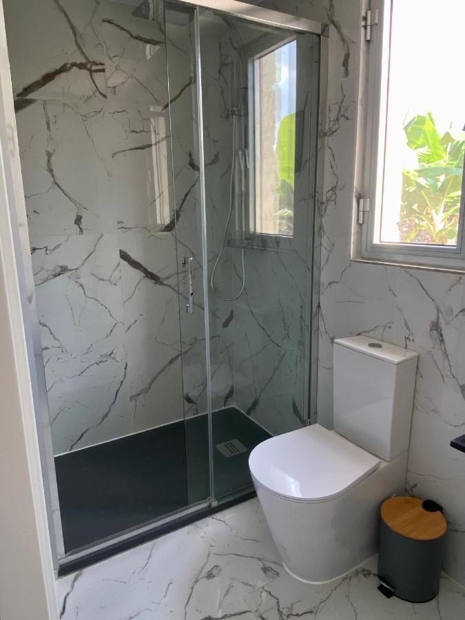 Ammos Luxury Suits And Residences Пея Екстериор снимка