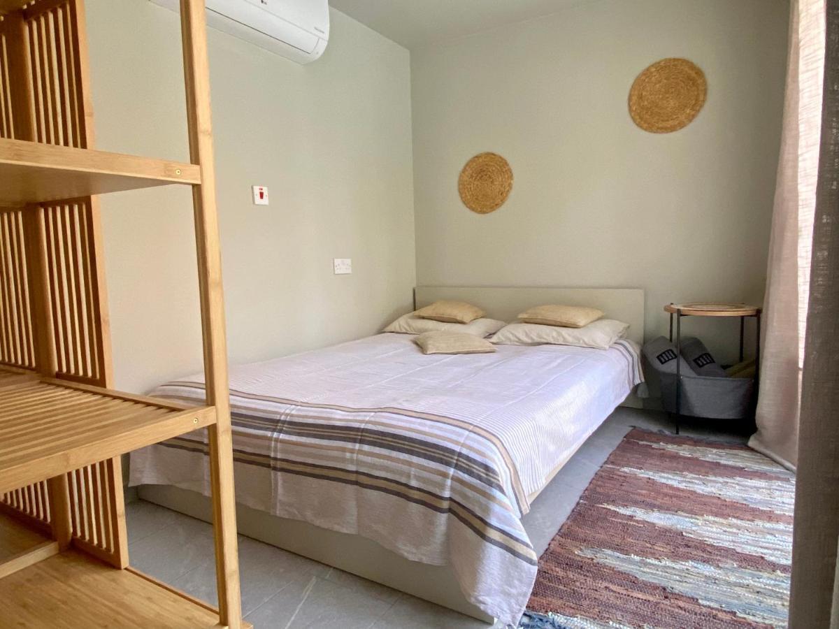 Ammos Luxury Suits And Residences Пея Екстериор снимка