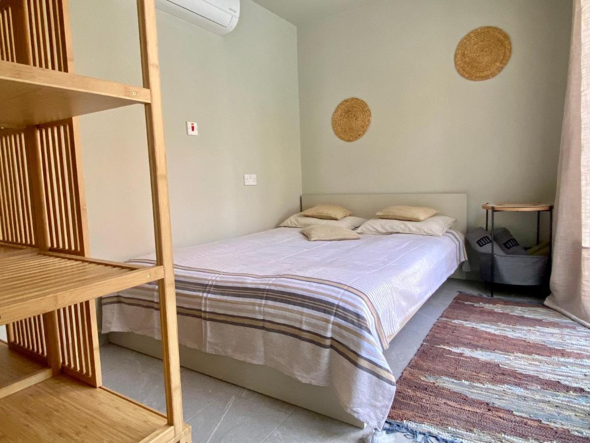 Ammos Luxury Suits And Residences Пея Екстериор снимка