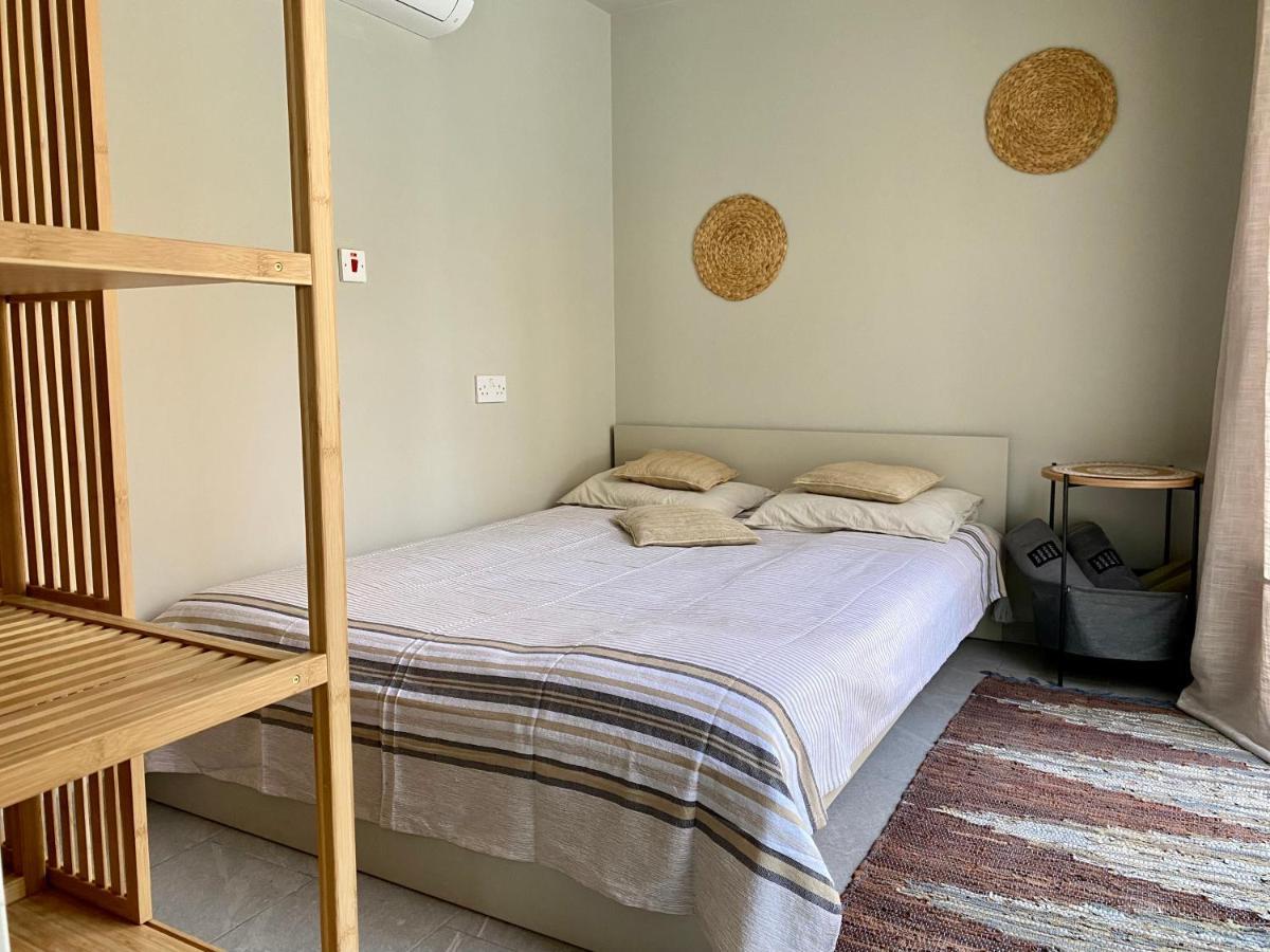 Ammos Luxury Suits And Residences Пея Екстериор снимка