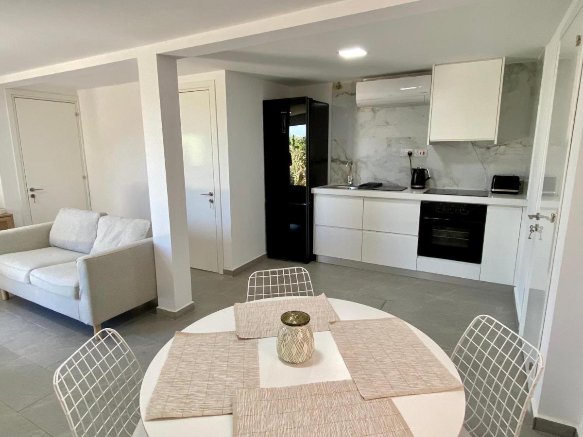Ammos Luxury Suits And Residences Пея Екстериор снимка